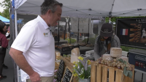Larry McClements looking for fresh ingredients at the Newhall Farmers Market.